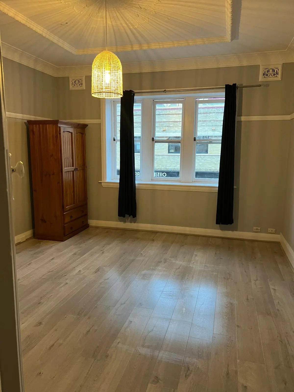 Vacant rental property bedroom cleaned thoroughly during a professional move out cleaning service.